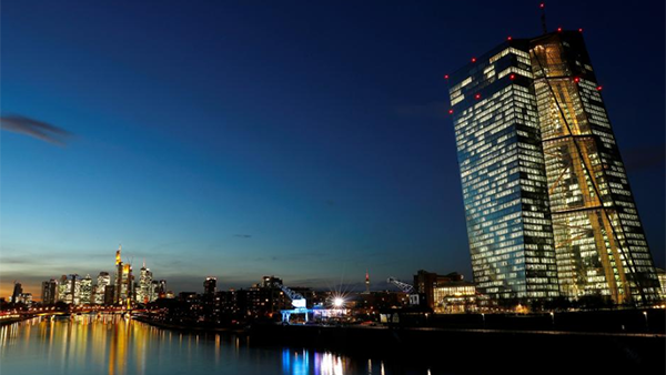 ECB ends crisis-fighting bond buys but eyes increasing risks